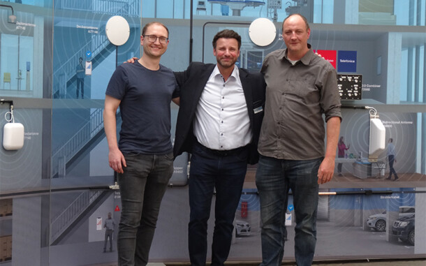 LOGSOL übernimmt die Logistikplanung bei Spinner GmbH. Zu sehen sind die Projektverantwortlichen im Firmengebäude