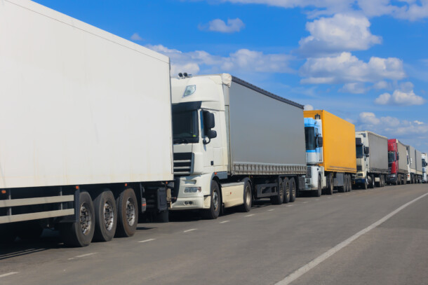 Trucks on road in a traffic jam
